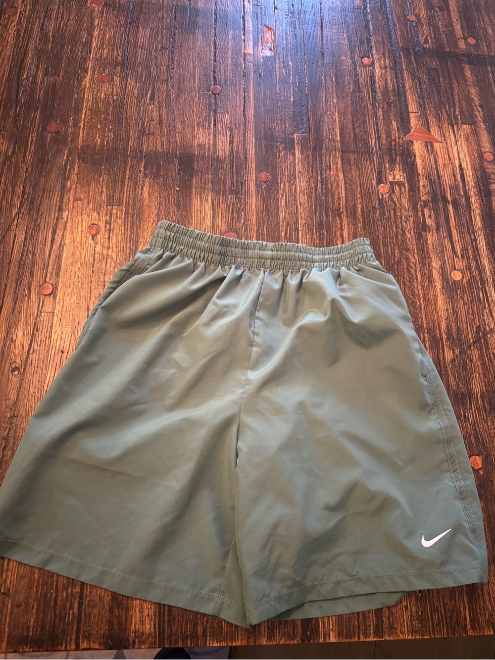 Nike Olive Green Kids Athletic Shorts with White Swoosh